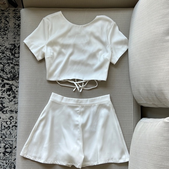 Pants - White 2 piece short set. Thicker satin like material. Size Medium (M).